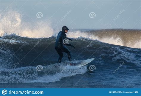 Surfers On Tynemouth Beach Editorial Stock Image Image Of Waves