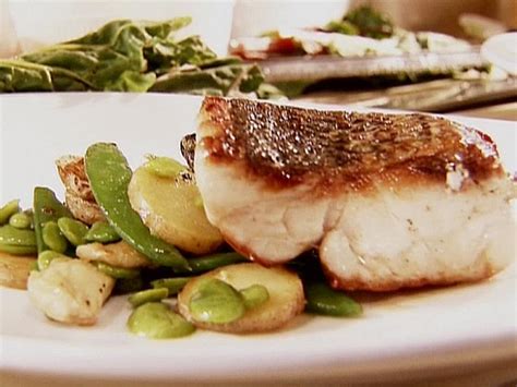seared wild striped bass with sauteed spring vegetables recipe anne burrell food network