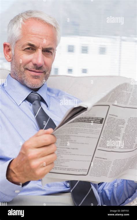 Businessman Reading A Newspaper Stock Photo Alamy