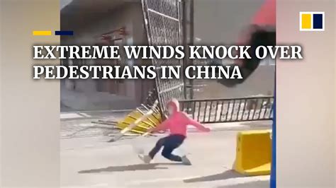 extreme winds knock over pedestrians in china youtube