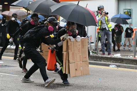 Hong Kong Protesters Clash With Riot Police As China Marks 70 Years Of