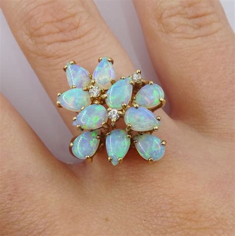 9ct Gold Opal And Diamond Stepped Design Ring Three Round Brilliant