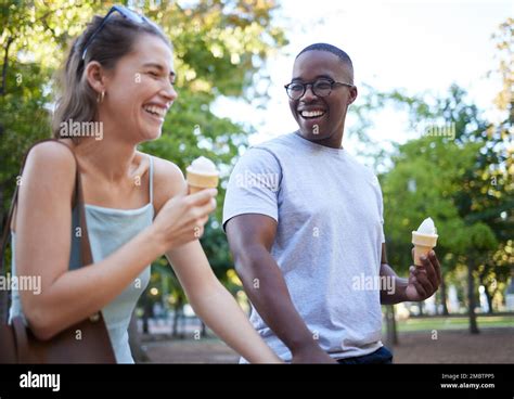 Interracial Couple Laughing And Ice Cream For Funny Joke Conversation