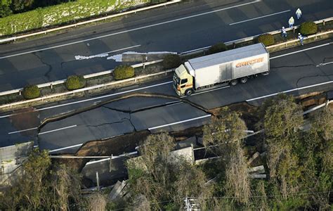 Death toll climbs after 6.1 temblor strikes osaka. Japan earthquake: Photos of damaged houses and roads around Kumamoto on Kyushu island
