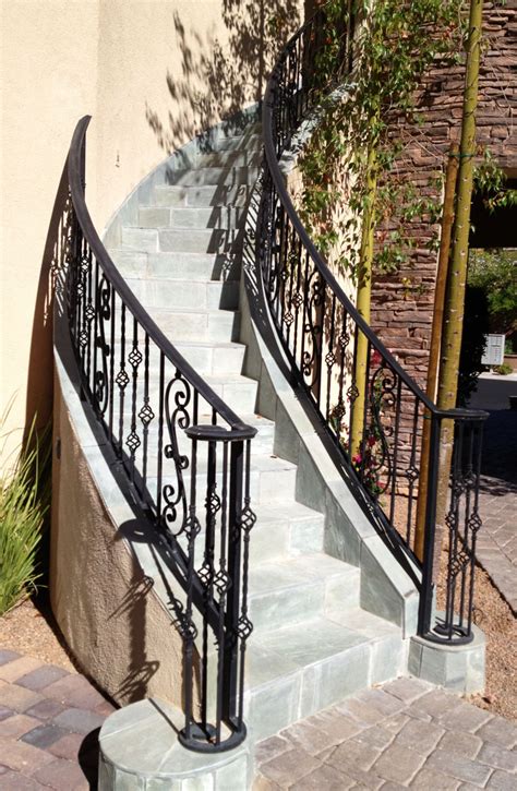 The stair handrail adopts wrought iron material, which has higher strength and more durable than other iron handrails. Wrought Iron Stair Railings Exterior | Newsonair.org