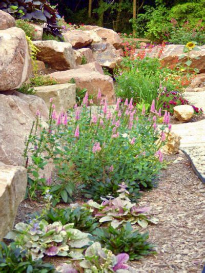 Creating Beauty And Structure With A Rock Wall Garden Garden Therapy