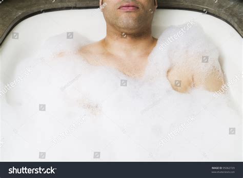Man Soaking In Bubble Bath Stock Photo 95062729 Shutterstock