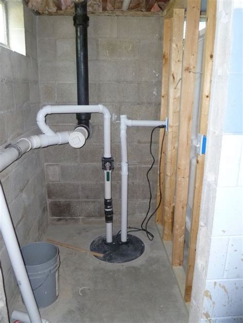 Identify the main waste stack that goes from the upstairs bathroom to the sewer. Sewage Ejector Pump | Basement bathroom design, Sewage ...