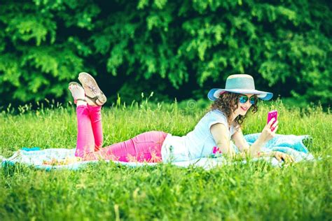 Pretty Girl Outdoor Lying On The Grass In The Park Stock Image Image
