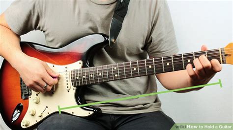 How we hold a guitar is how we use our bodies. How to Hold a Guitar: 12 Steps (with Pictures) - wikiHow