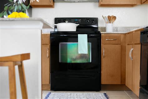 Heat a damp micro cloth in a microwave for 35 seconds, then use it to quickly wipe away the grease layer. How To Clean Wood Cabinets | Kitchn