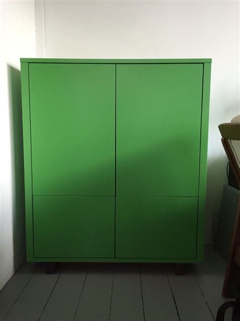 The distinctive grain pattern in the walnut veneer gives each piece of furniture a unique character. IKEA STOCKHOLM - Cabinet with 2 drawers | Green | in ...
