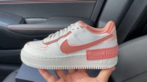 Dressed in a white, particle grey, grey fog, and photon dust color scheme. Nike Air Force 1 Shadow White Coral Pink shoes - YouTube