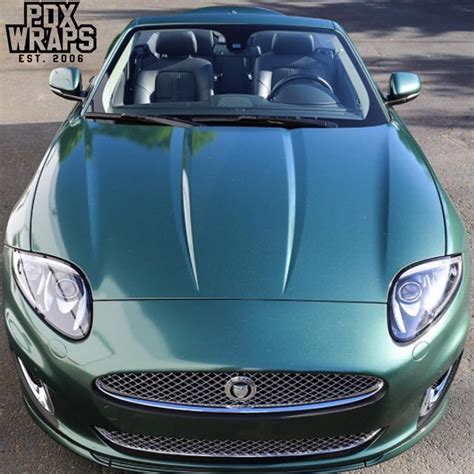 Maybe you would like to learn more about one of these? Jaguar RK wrapped in Matte Pine Green Metallic vinyl