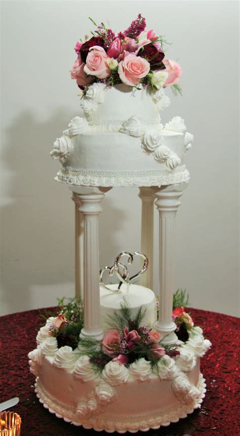 2 Tier Wedding Cake With Columns And Icing Roses Wedding Cake Pictures Wedding Cakes With