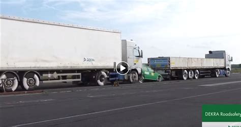 dramatic video shows what happens to a car sandwiched between two trucks hooniverse