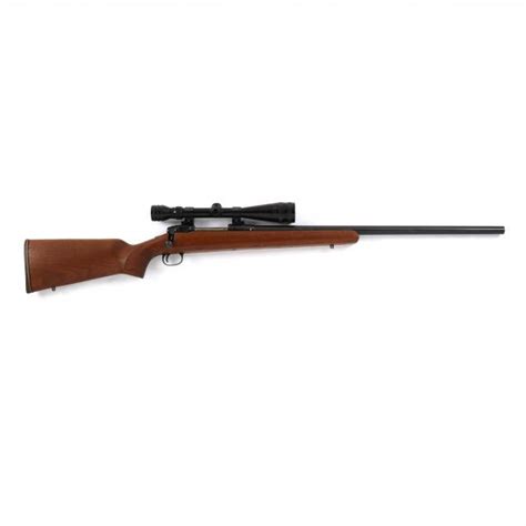 Savage Model 112 Series J Caliber 220 Swift Rifle With Redfield Scope