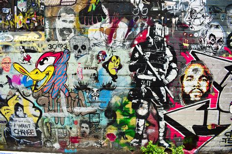 Colorful Street Art Design On Wall With Pop Culture Icons On Wall In