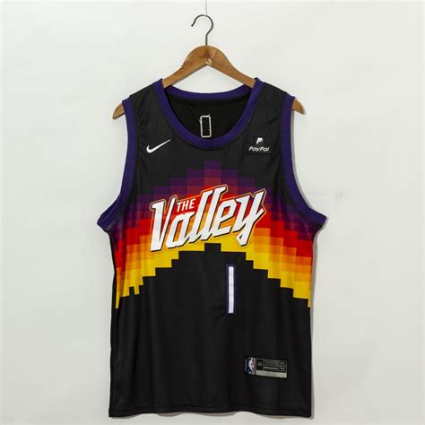 The alternate jersey has mountains in the background with the words the valley. Devin Booker #1 Phoenix Suns 2021 City Edition Swingman Jersey