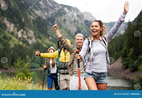 Group Of Happy Friends With Backpacks Hiking Together Stock Image