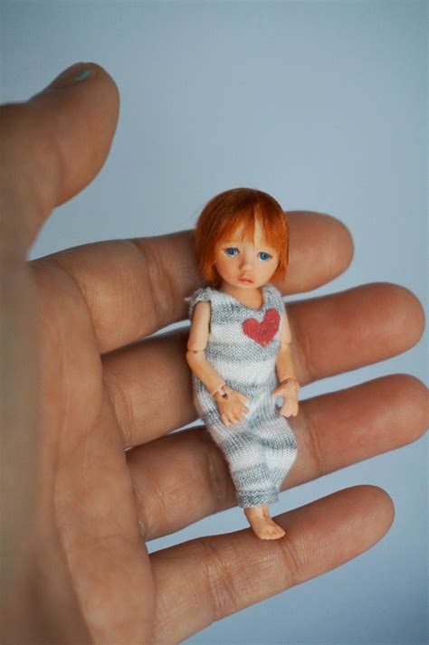 my newest tiny ball jointed doll she is about 2 5” 6cm tall i make dolls mainly for 1 12 and