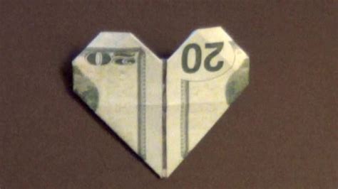 Several folks expressed an interest in how this napkin fold is achieved. Dollar Origami Heart How to make a Dollar Heart - YouTube