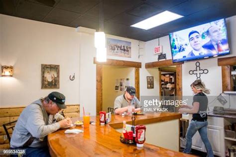Man Eating At Diner Counter Photos And Premium High Res Pictures