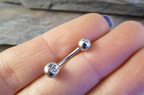 Buttons allow users to take actions, and make choices, with a single tap. Simple Crystal Belly Button Ring Jewelry | Belly button ...