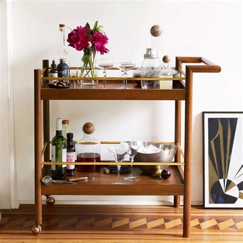 The top features a hot table with a warming tray and one electric burner. Mid-Century Bar Cart | west elm UK