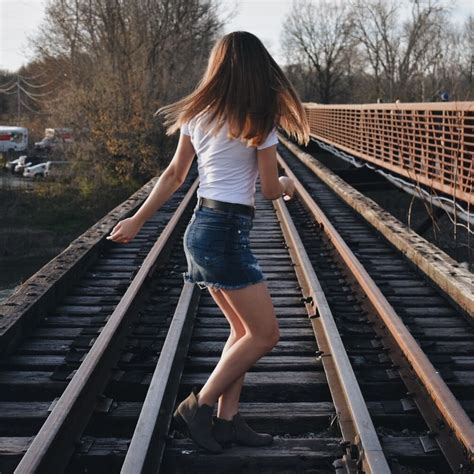 Pin By Lauren Craig On Model Poses Railroad Photoshoot Railroad Photoshoot Model Downtown