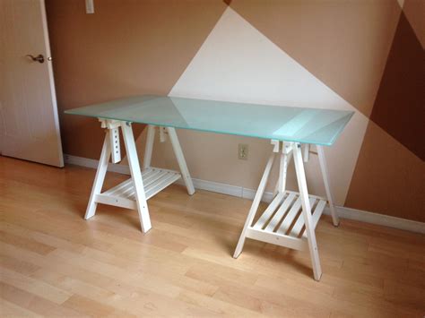 They come in several sizes to fit your space, too. IKEA Glass desk top with adjustable white trestle legs. IKEA GLASHOLM glass table top (58 1/4x28 ...