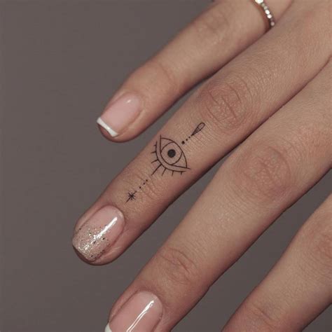 Top More Than 75 Evil Eye Finger Tattoo Latest In Cdgdbentre