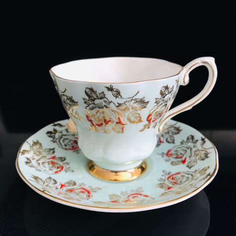 Royal Grafton Tea Cup And Saucer England Fine Bone China Aqua With Gold And Red Roses Rare