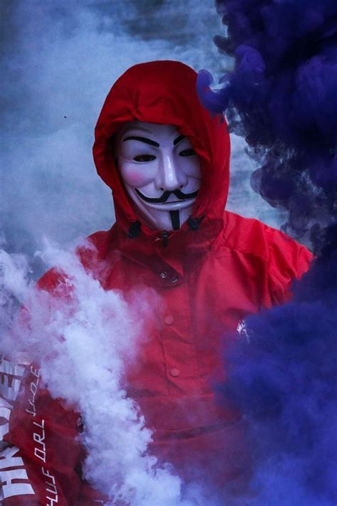 Walking man wearing black hoodie, blue denim jeans, and black shoes outfit, walking person. Download 640x960 Guy Fawkes Mask, Anonymous, Smoke, Red ...