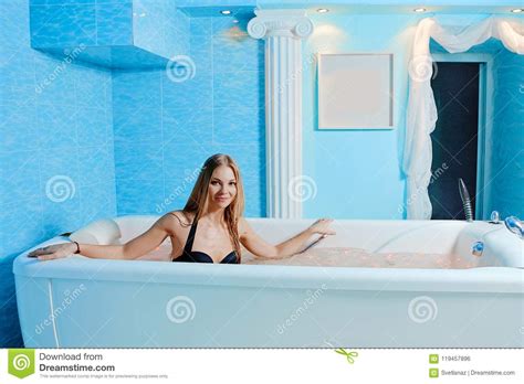 Beautiful Woman Smiling In The Hot Tub Vacation In A Spa Resor Stock Photo Image Of Jets