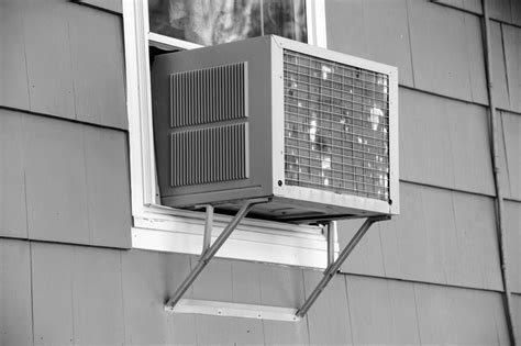 in 1931 two individuals invented the first individual room air conditioner that sits on the