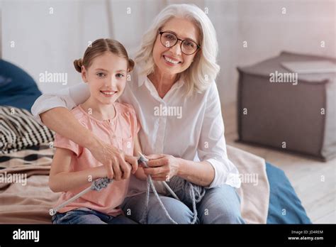 Joyful Cheerful Girl Knitting Stock Photo Alamy