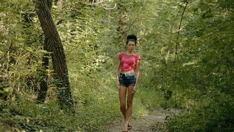 Sexy Young Woman Walking Through The Woods Stock Footage Video 14016197