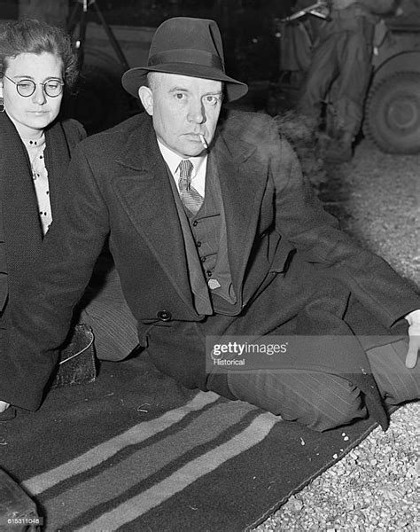 The Nazis Puppet Ruler Of Holland Sits On A Blanket On The Ground