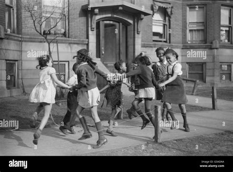 Children Playing Ring Around Rosie Black And White Stock Photos