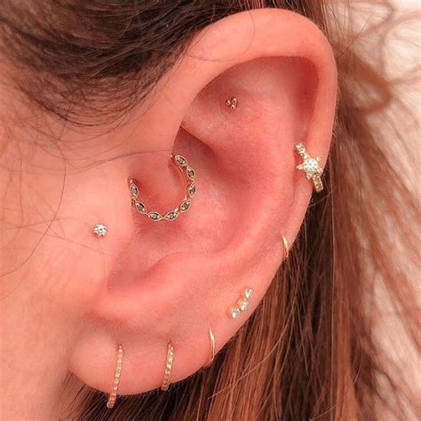 Ear Curation On Instagram Faux Rook Upper Helix Mid Helix Daith Tragus And Four Lobe