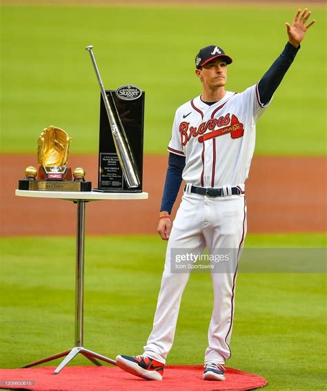 The Atlanta Braves Pitcher Waves To Fans As He Stands On The Mound With
