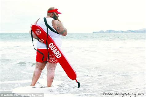 Burly Man Strips To His Swim Trunks For Sexy Dudeoir Shoot On The Beach That Sees Him Running