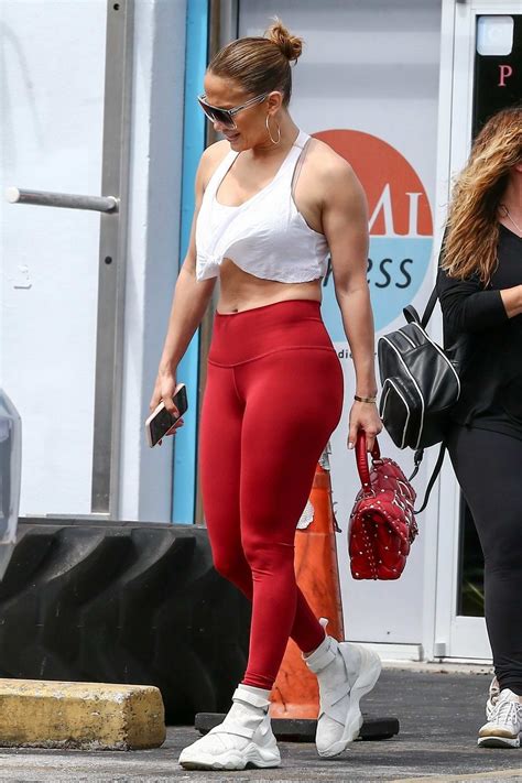 Jennifer Lopez Shows Off Her Fab Figure In A White Crop Top And Red Leggings As She Arrives At