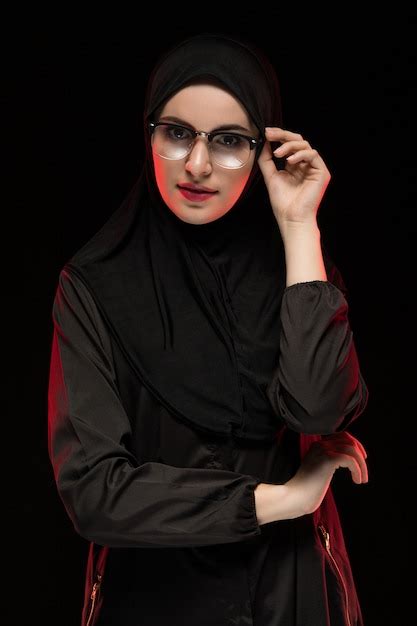 Premium Photo Portrait Of Beautiful Trendy Young Muslim Woman Wearing Black Hijab And Glasses