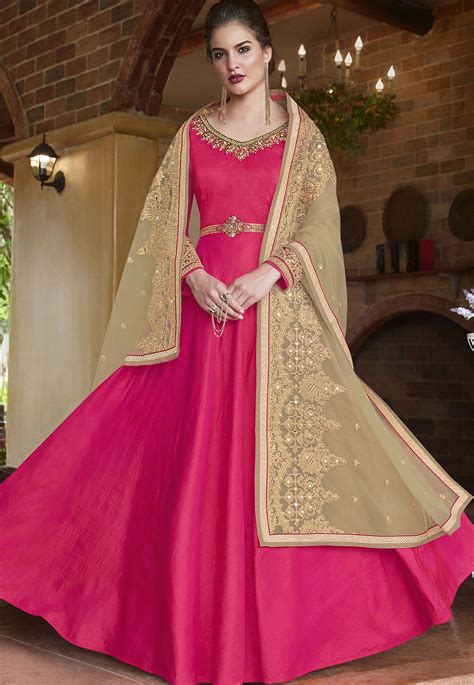 Summers are the perfect time to go on a shopping spree and buy ethnic wear for upcoming weddings. Rani banarasi silk Indian wedding wear anarkali suit 4507