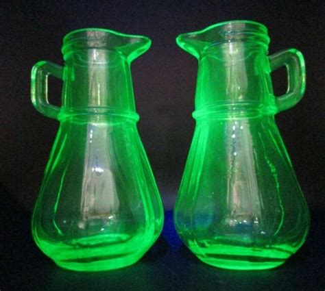 Two Hazel Atlas Uranium Glass Paneled Syrup Pitchers Tall Ebay