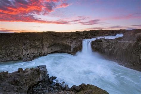 Colorful Skies Over Stunning Waterfalls In Iceland Photographic Print