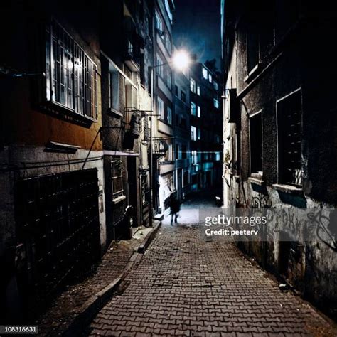 Walking Down Dark Alley Photos And Premium High Res Pictures Getty Images