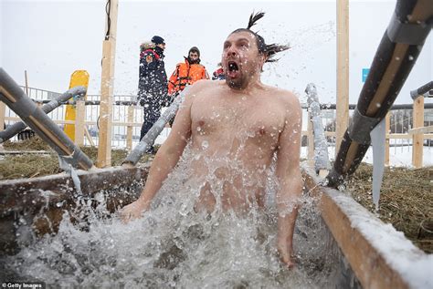 Brave Orthodox Christians Plunge Into Icy Water For Epiphany Celebrations Across Europe Despite